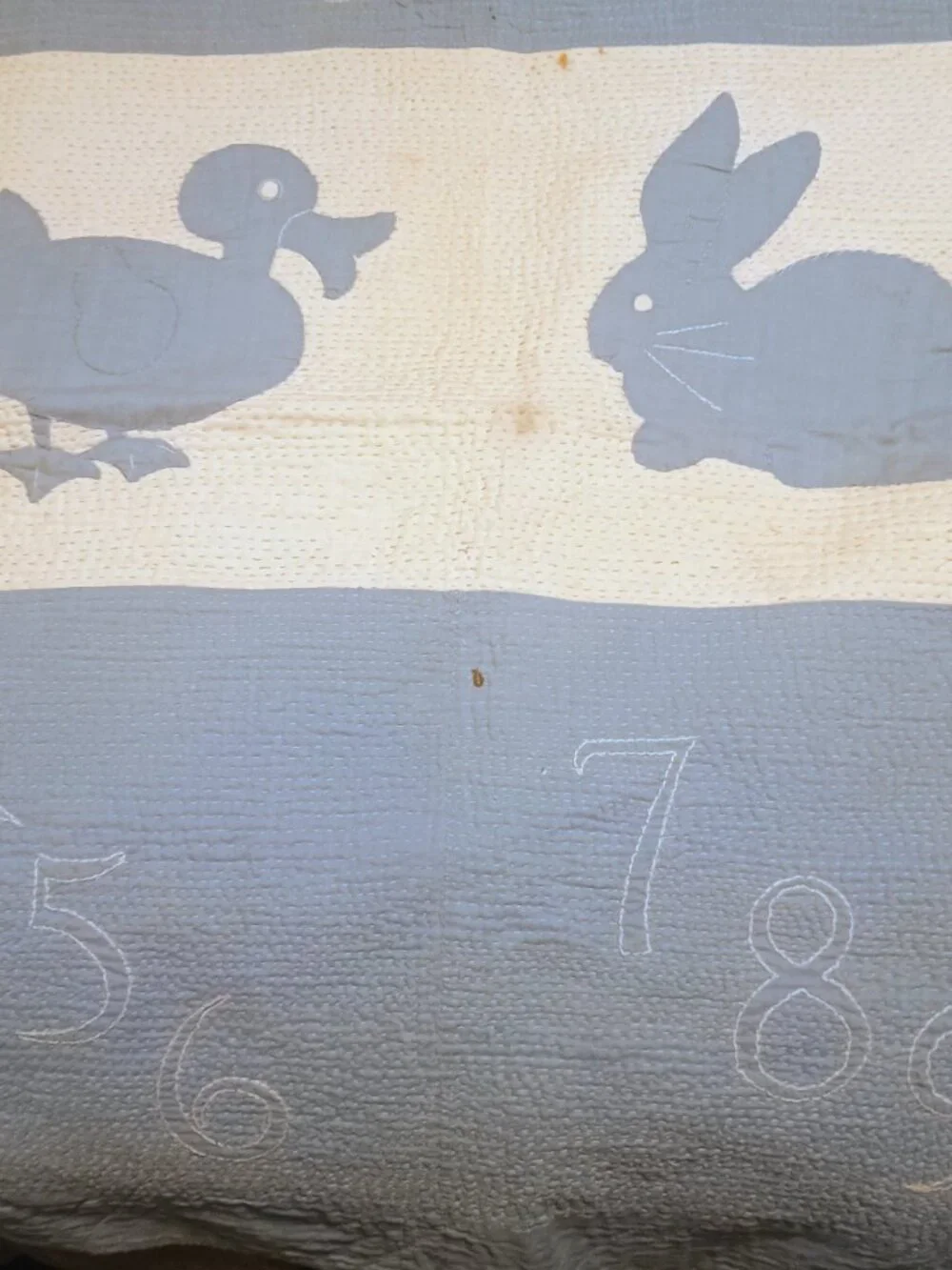 Handstitched antique baby